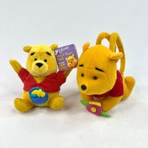 Two Vintage Winnie The Pooh Toys